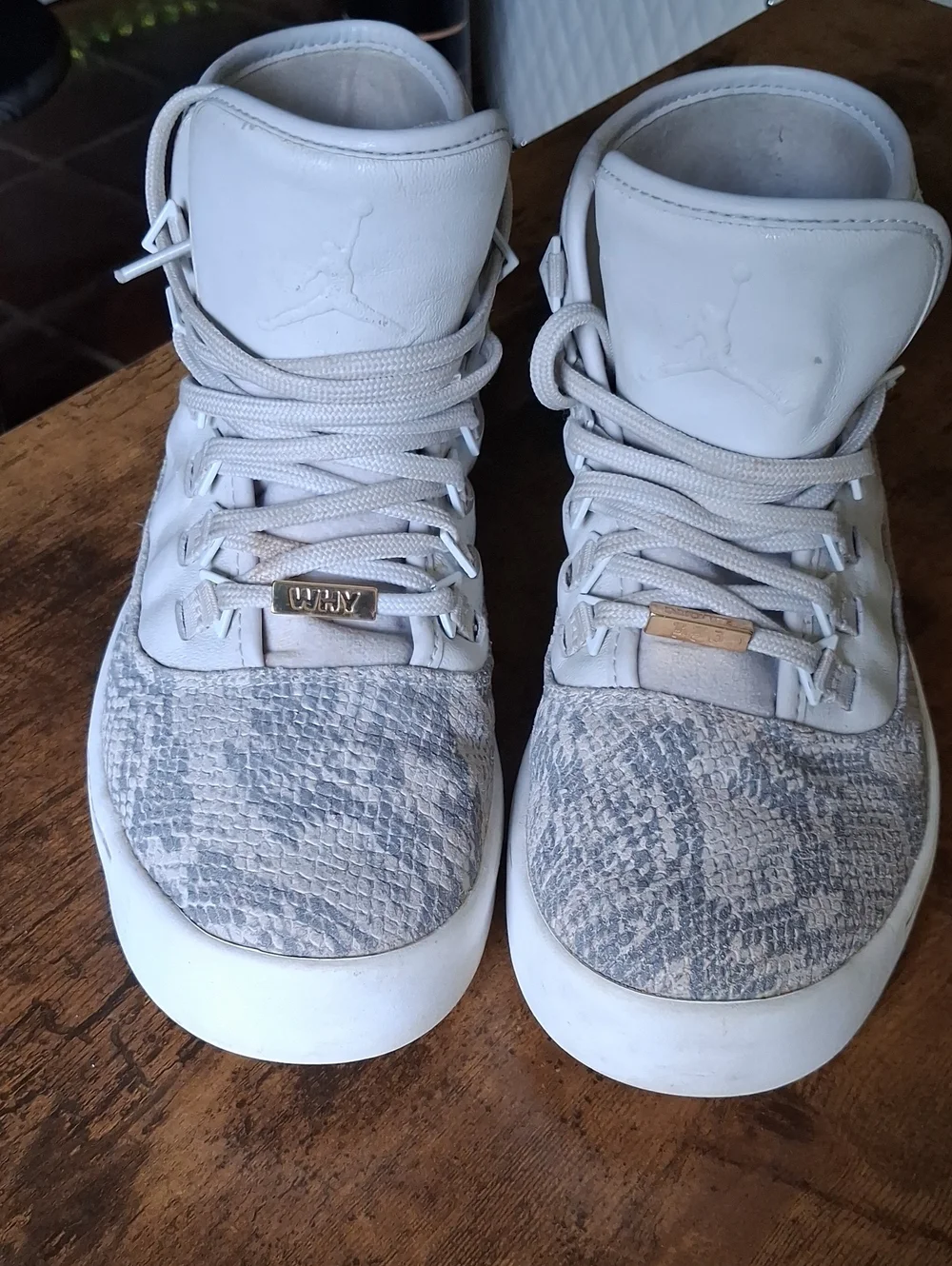 Jordan High Top Sneakers in Light Gray with Snake-Texture Toe